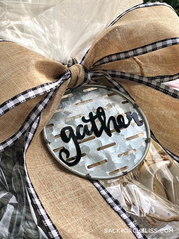 Close up of gather tag and natural bow with gingham trim.