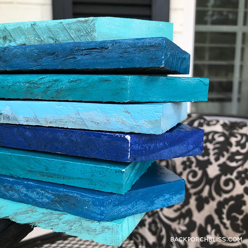 Stack of painted pallet wood for sign 