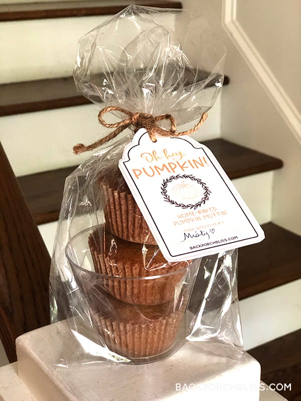 Package of pumpkin muffins with gift tag. 