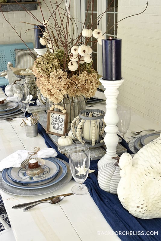 table using Mary Hadley stoneware, classic blues